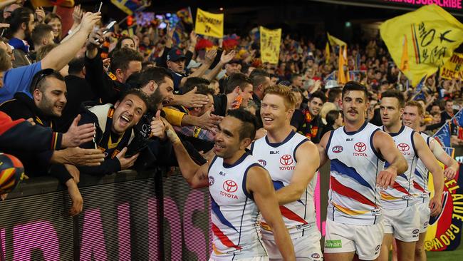 Adelaide celebrate their win with fans. Picture: Alex Coppel.