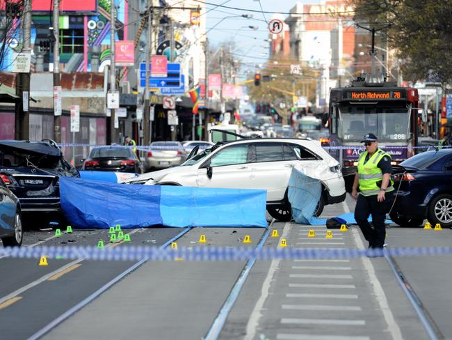 Police at the scene on Chapel Street. Picture: Andrew Henshaw