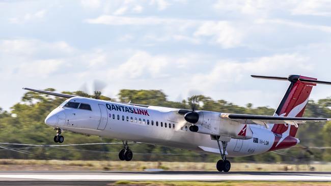 A QantasLink Dash-8 similar to the one pictured is the subject of a new ATSB investigation following another wheels down incident.