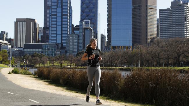 A woman exercising along the Yarra River on Sunday. Picture: Daniel Pockett/Getty Images