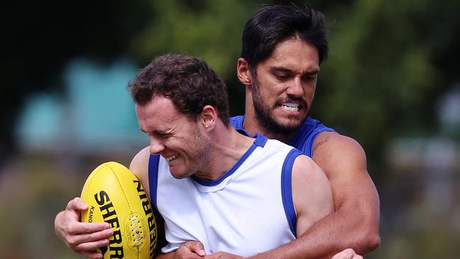 Aaron Hall tackles teammate Jack Mahony at training. Picture: Michael Klein