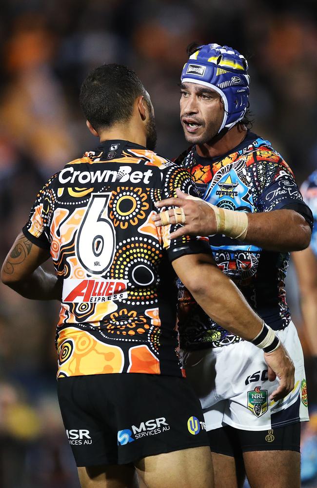 Benji Marshall and Johnathan Thurston embrace at full-time. Picture. Phil Hillyard