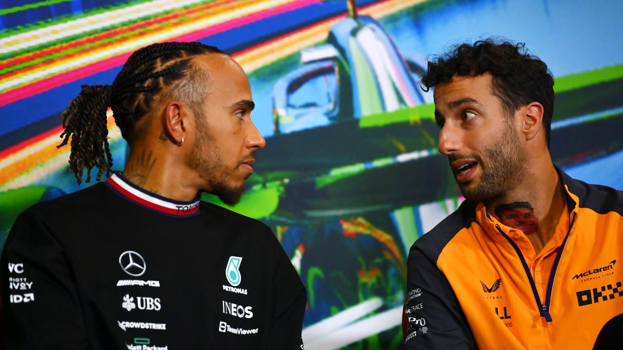MONZA, ITALY - SEPTEMBER 08: Lewis Hamilton of Great Britain and Mercedes and Daniel Ricciardo of Australia and McLaren attend the drivers press conference during previews ahead of the F1 Grand Prix of Italy at Autodromo Nazionale Monza on September 08, 2022 in Monza, Italy. (Photo by Dan Mullan/Getty Images)