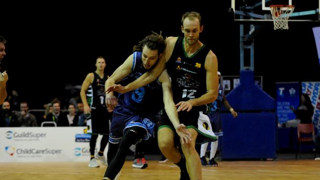 Mount Gambier’s Lewis Thomas (right) in a Pioneers game from last year. The southeast club has been denied a move to the New Zealand National Basketball League. Picture: Fiona Harding