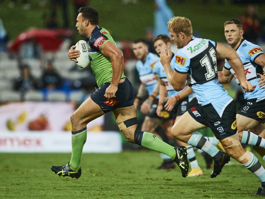 Ryan James of the Raiders makes a linebreak against the Sharks. Picture: Brett Hemmings/Getty Images