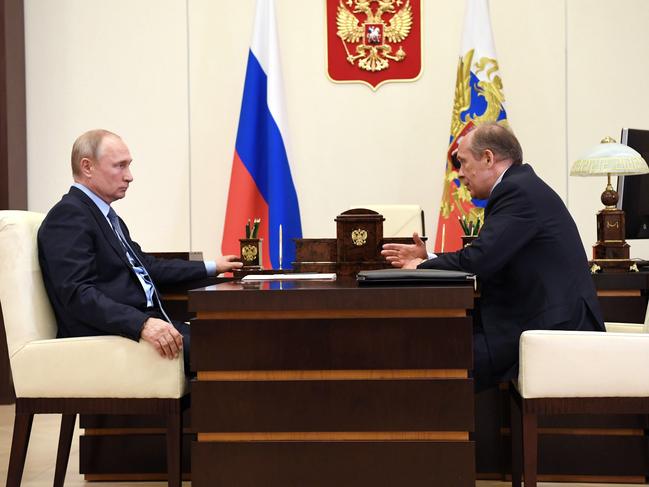 Vladimir Putin and Alexander Bortnikov during a meeting at Novo-Ogarevo residence. Picture: Getty Images