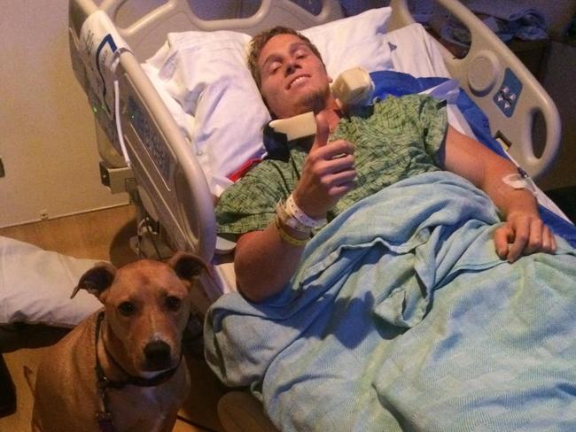 BMX star Sam Willoughby gives a thumbs up from his hospital bed.
