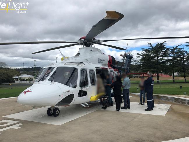 A RACQ LifeFlight Rescue chopper flew a woman to hospital after being hit by a car.