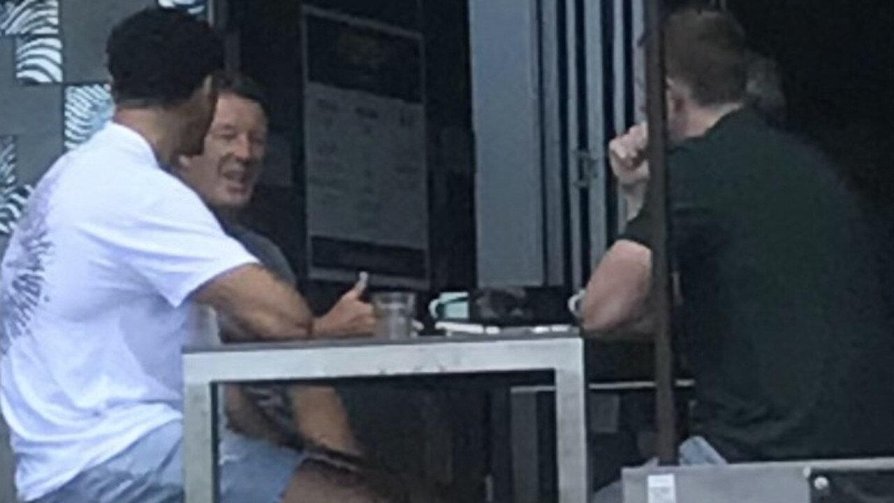 Melbourne Storm coach Craig Bellamy meeting with Brisbane Broncos winger Xavier Coates at a Gold Coast cafe.