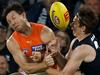 MELBOURNE, AUSTRALIA - APRIL 20: Toby Greene of the Giants and Jordan Boyd of the Blues collide during the 2024 AFL Round 06 match between the Carlton Blues and the GWS GIANTS at Marvel Stadium on April 20, 2024 in Melbourne, Australia. (Photo by Michael Willson/AFL Photos via Getty Images)