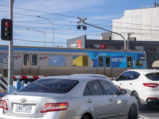 Traffic continues to be held up at the Glenroy Rd crossing. Picture: Andy Brownbill