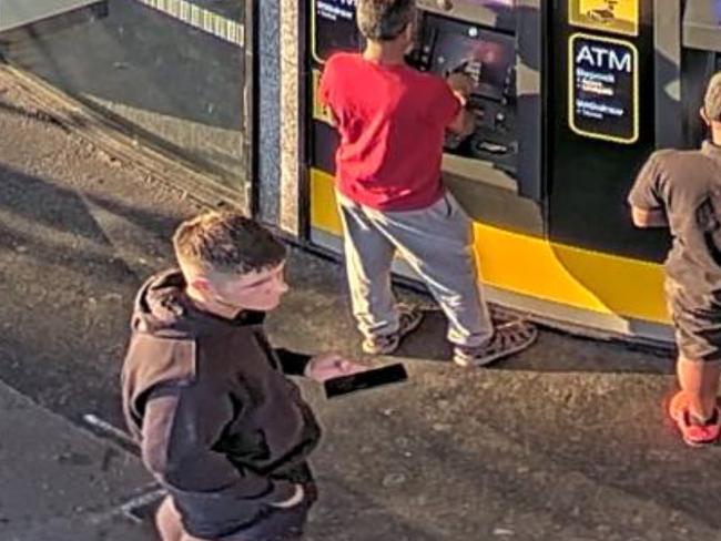 Tuite pictured at an ATM in the lead up to the kidnapping.