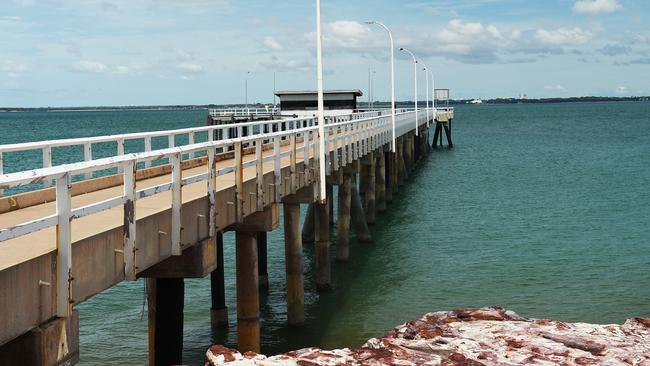 A woman who fell and injured herself near the Mandorah jetty in a rising tide had to be stabilised before being flown by CareFlight to Royal Darwin Hospital