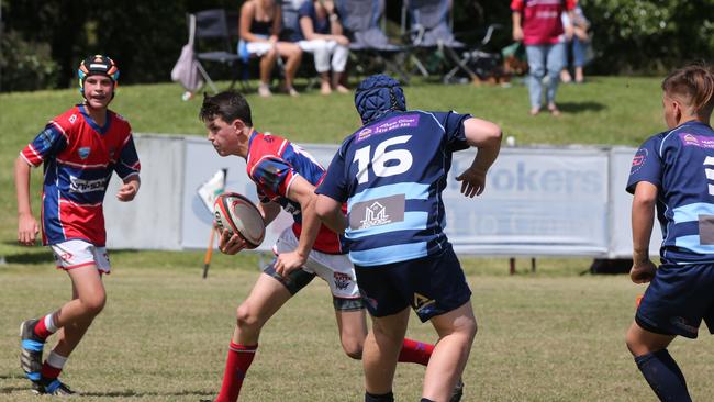Action galleries of the junior rugby union grand finals, match played at Surfers Paradise Home Ground. Helensvale Hogs Vs Bond Uni Pirates under 14s division. Picture Mike Batterham