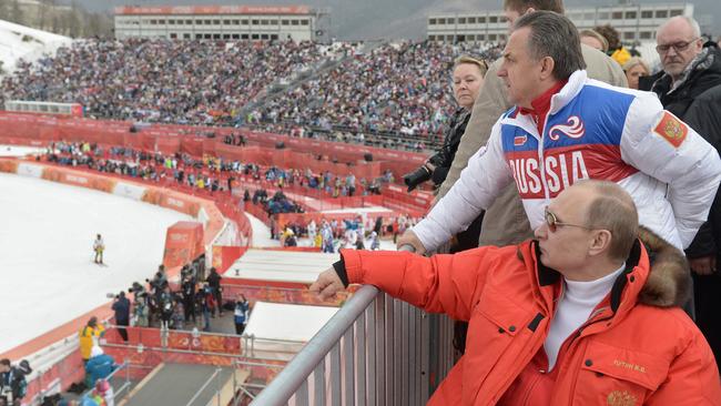 Vitaly Mutko, left, then Russia’s sports minister, with Putin. Picture: AP