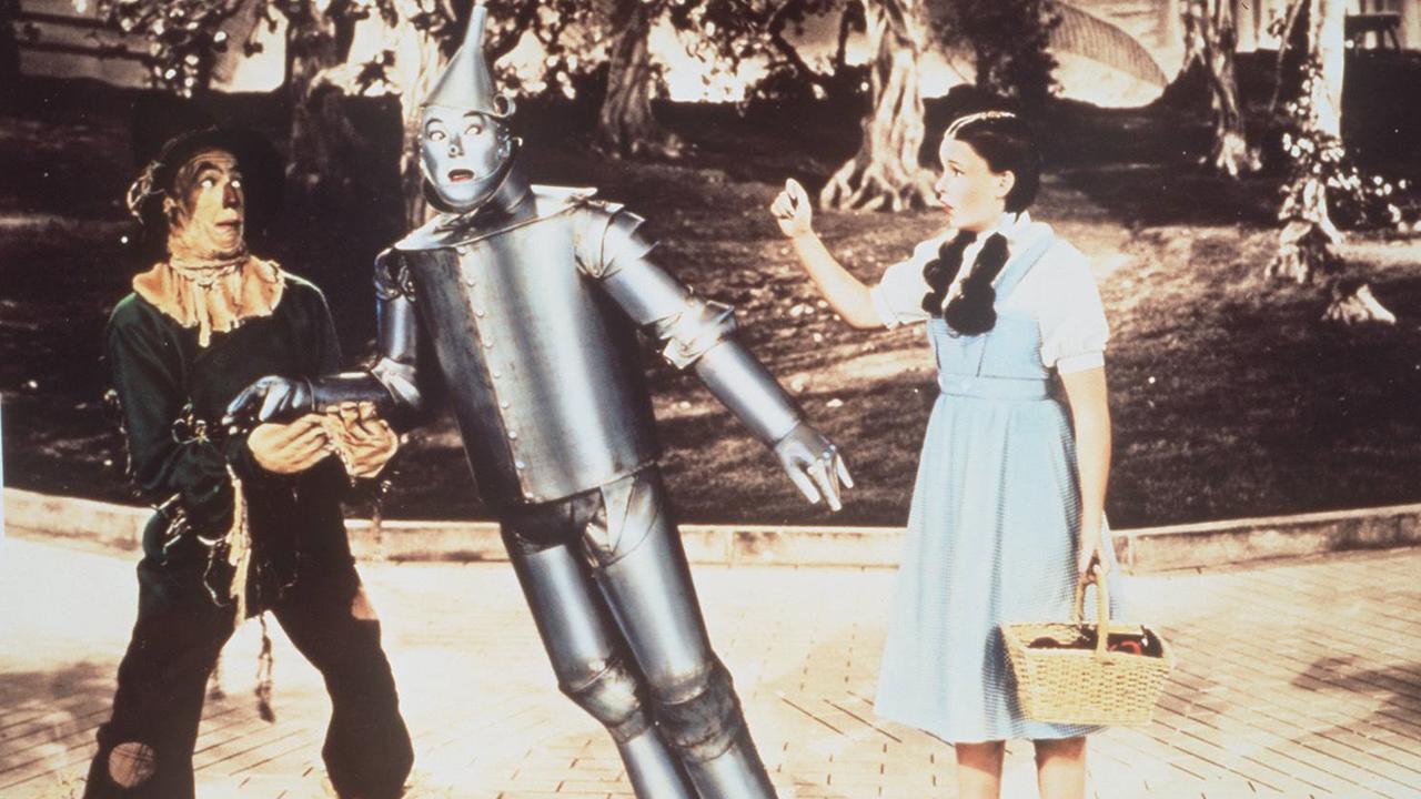 Dorothy (Judy Garland), Toto the dog, Tin Man, Scarecrow in Wizard of Oz   actress actor movies film scene