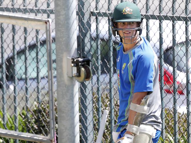 CRICKET: Wednesday 9th November 2016, Blundstone Arena: Australian bowler Joe Mennie pads up for batting practice ahead of the second test against South Africa in Hobart. Picture: LUKE BOWDEN