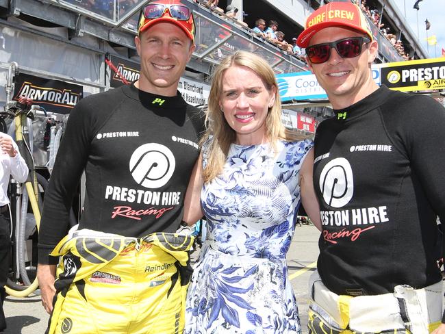 Colour from Supercars GC 600 at Surfers Paradise. Games Minister Kate Jones with Supercar drivers  Karl Reindler and Lee Holdsworth before the race start.    Picture Glenn Hampson