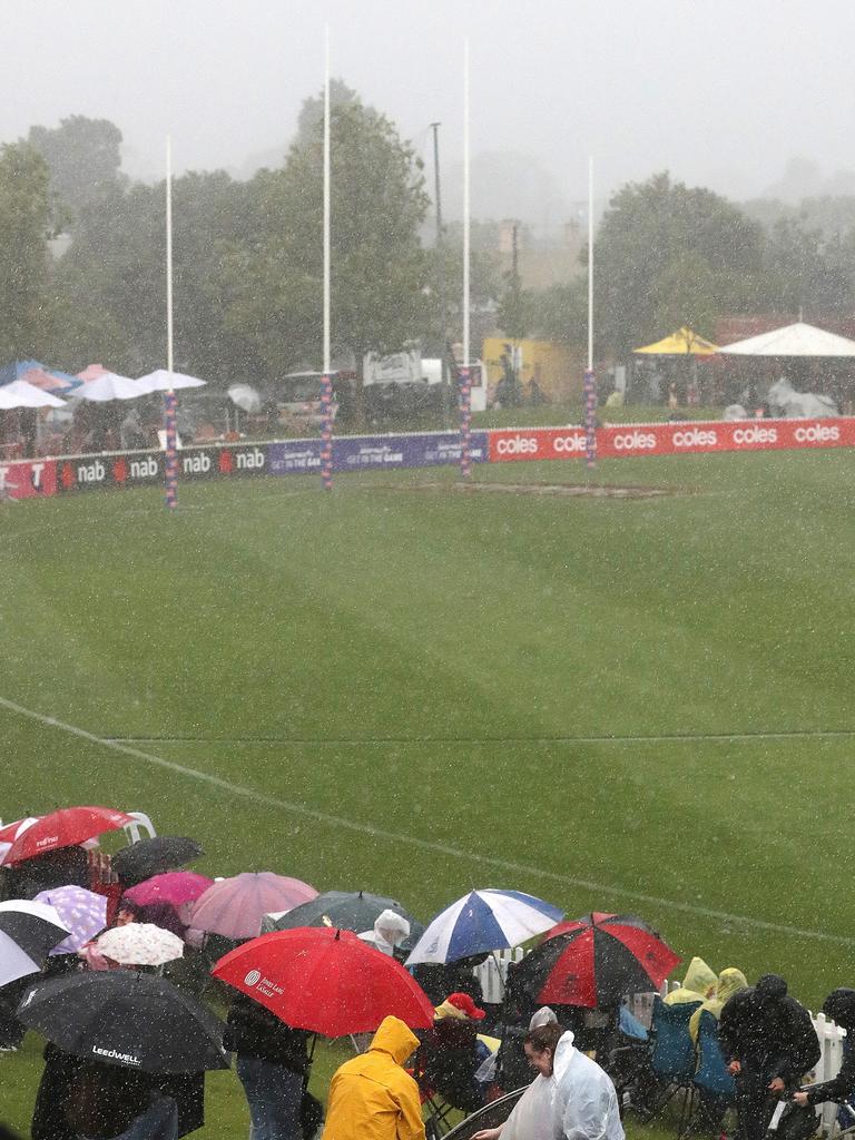 Play stopped due to lightning strikes. Picture: Sarah Reed/AFL Photos via Getty Images