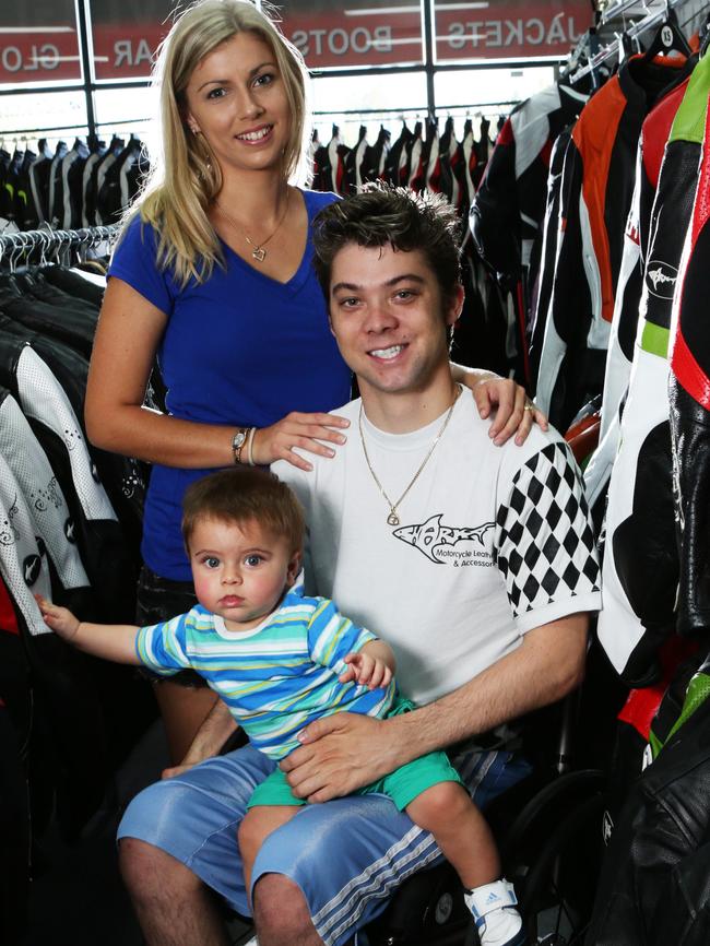 EXPANSION MODE: Ex-motorcycle racer Matthew Kuhne with wife Kylie and 10-month-old son Levi - Mr Kuhne’s apparel business Shark Leathers has also expanded with stores in Sydney and Melbourne.