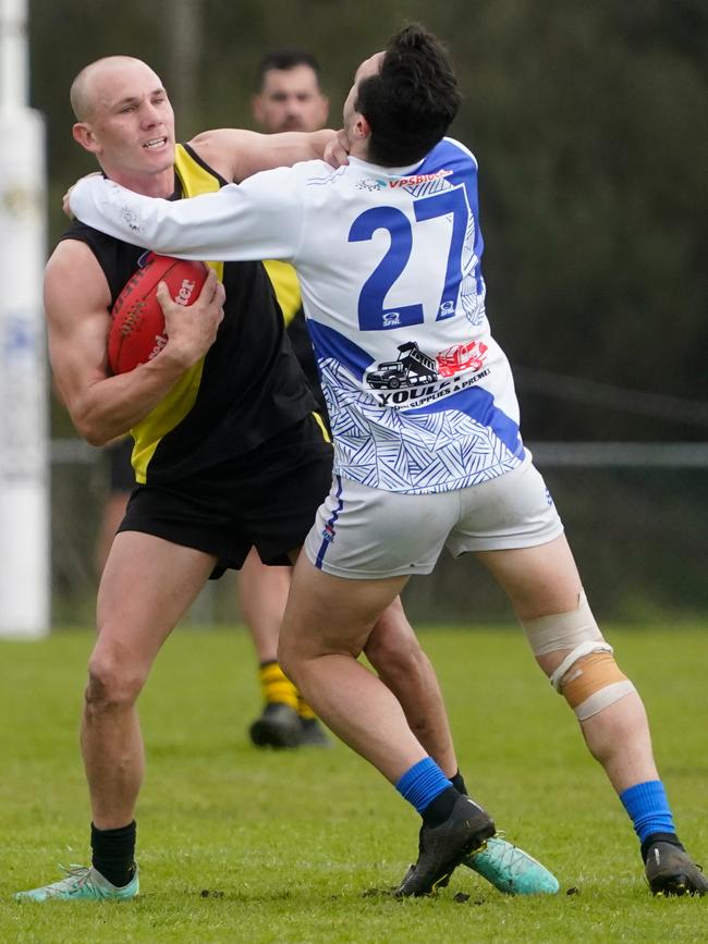 SFNL: South Mornington’s Jayden Davis gets taken high. Picture: Valeriu Campan