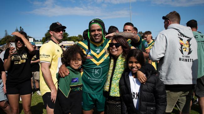 Cudgen players and fans celebrating after winning the reserve grade grand final against Ballina. Photo: Elise Derwin