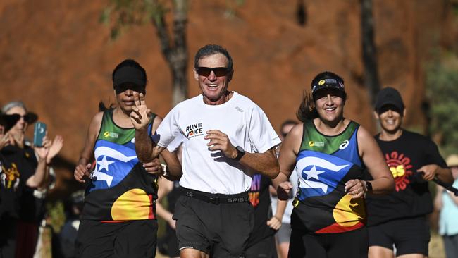 Pat Farmer finished his run around the country to raise awareness about the Yes campaign in Uluru. Picture: NCA NewsWire / Martin Ollman