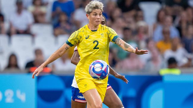 MARSEILLE, FRANCE - JULY 31: Michelle Heyman #2 of Australia is defended by Naomi Girma #4 of the United States  during the Women's Group B match between Australia and USWNT during the Olympic Game Paris 2024 at Stade de Marseille on July 31, 2024 in Marseille, France. (Photo by Brad Smith/ISI/Getty Images).