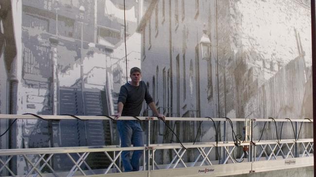 A photo of Mol and the mural in 2007. Picture: News Corp Australia