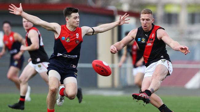 North Launceston’s Brad Cox-Goodyer (right) was awarded three votes in round eight as the Bombers got revenge on cross town rivals Launceston. Picture: NIKKI DAVIS-JONES