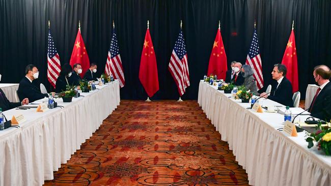 US Secretary of State Antony Blinken joined by National Security Adviser Jake Sullivan (R), speaks while facing Yang Jiechi, director of the Central Foreign Affairs Commission Office, and Wang Yi, China's Foreign Minister at the opening session of US-China talks at the Captain Cook Hotel in Anchorage, Alaska. Picture: AFP