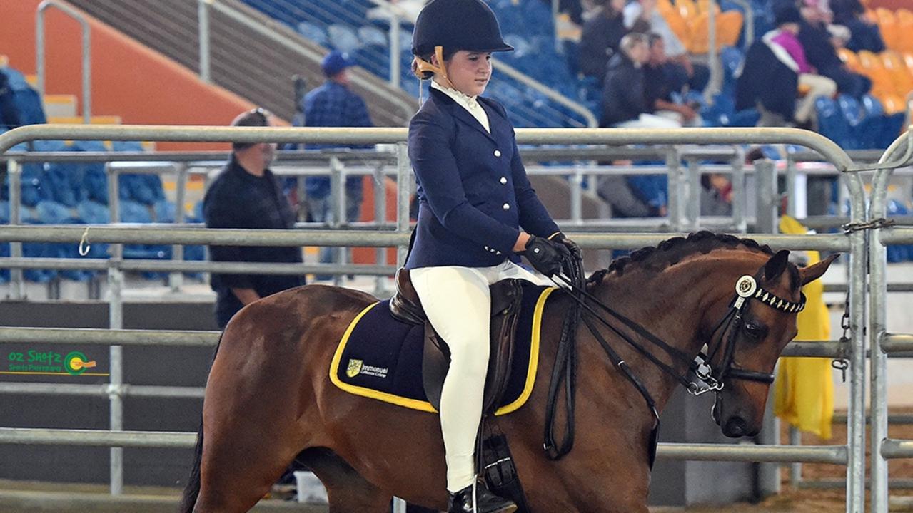 Pip Polla-Mounter and her pony Poppet or Whitmere Countess winning Qld Primary Show Horse Champion. Picture: Kylie Teirney