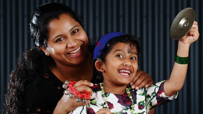 Aswathy Aishi, 33 of Ipswich, making music with her daughter Aishi Arun, 5, who has a Cochlear Nucleus 6 implant, Hear and Say centre, Ashgrove. Photographer: Liam Kidston.