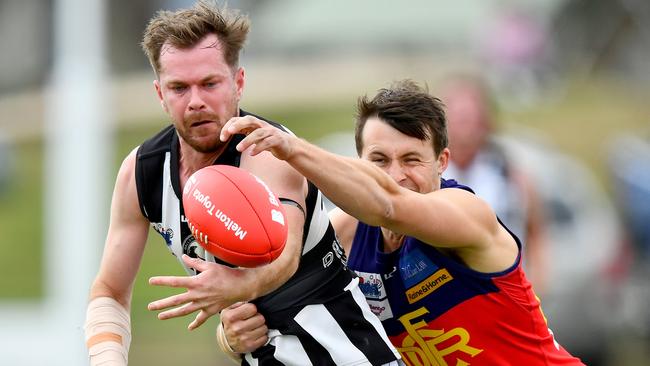 Wallan’s Sean Morris can’t escape the tackle. Picture: Josh Chadwick