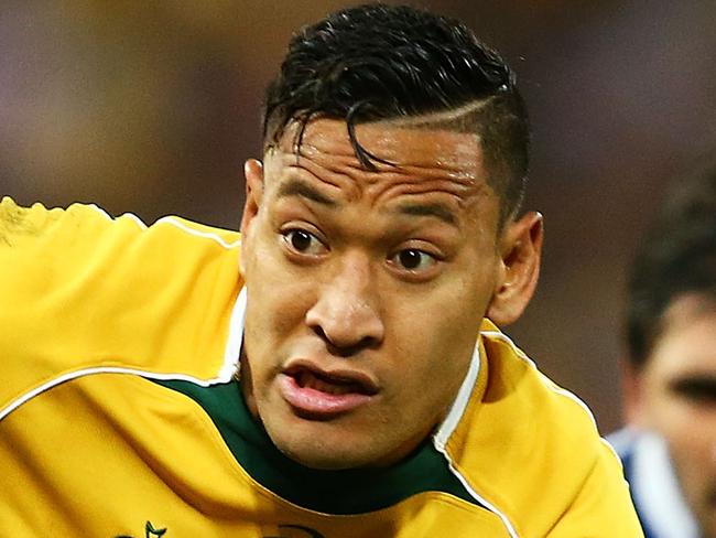 BRISBANE, AUSTRALIA - JUNE 07: Israel Folau of the Wallabies makes a line break during the First International Test Match between the Australian Wallabies and France at Suncorp Stadium on June 7, 2014 in Brisbane, Australia. (Photo by Mark Nolan/Getty Images)