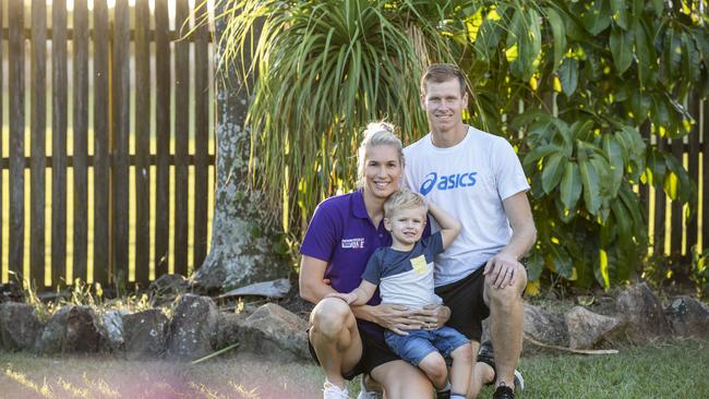 Jodie Kenny and her hockey husband Shane with their son Harrison Picture: Mark Cranitch.