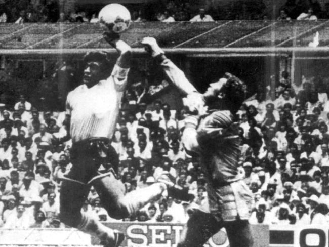 Diego Maradona (L) doing 'the hand of God’ goal.