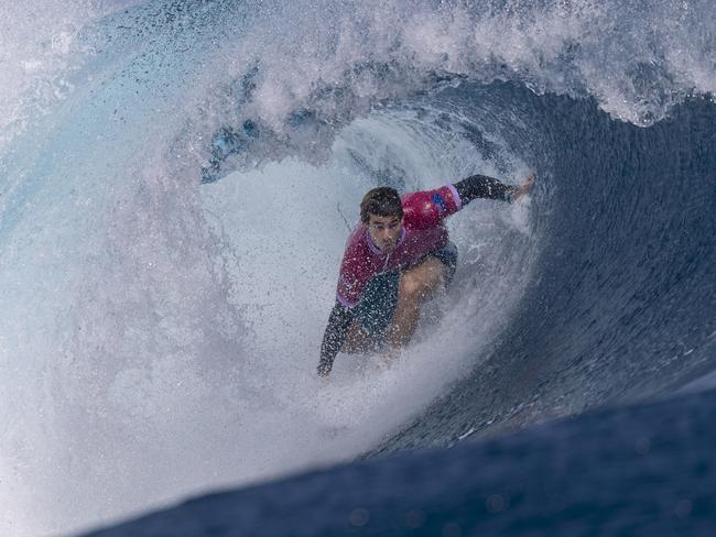 Robinson immersed in surf on his way to the Olympic semi-finals. Picture: Sean M. Haffey/Getty Images