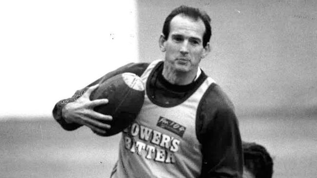 Wayne Bennett has a run with his Broncos’ players at training in 1993.