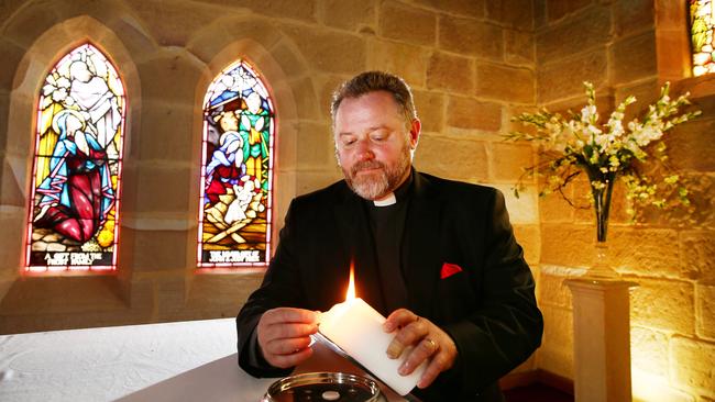 Father Rod Bower in St Mary’s historic Anglican Church, Gosford. Picture: Peter Clark