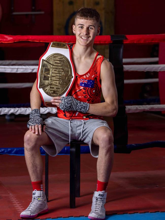 15 year old Jay Jones with the Gene Lewis Tournament championship belt. Picture: Ben Clark