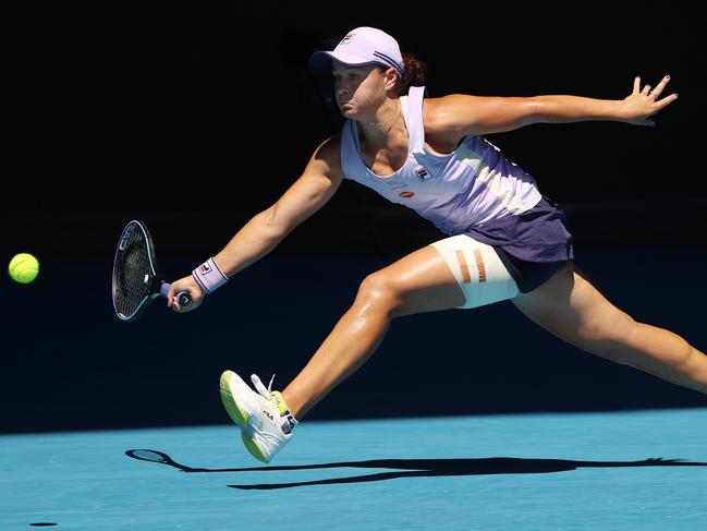 Australian Open tennis. 17/02/2021. Day 10.. Ash Barty vs Karolina Muchova on Rod Laver Arena.   Ash Barty at full stretch trying to run down a forehand   . Pic: Michael Klein