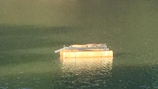 A little croc was found soaking up the sun on top of the croc trap at Durack Lakes in 2017. Picture: Supplied