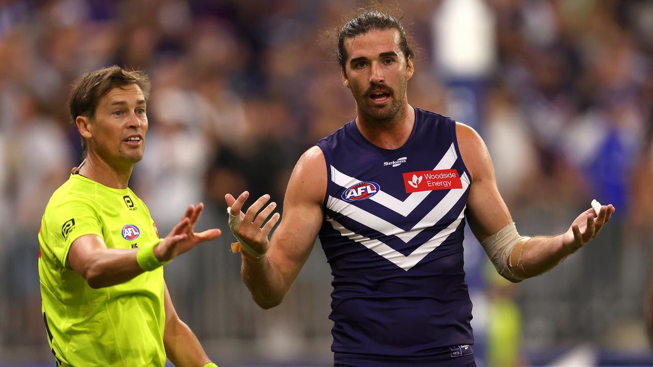 PERTH, AUSTRALIA – MARCH 25: Alex Pearce of the Dockers questions a call with the umpires after the siren during the round 2 AFL match between the Fremantle Dockers and North Melbourne Kangaroos at Optus Stadium, on March 25, 2023, in Perth, Australia. (Photo by Paul Kane/Getty Images)