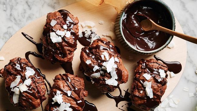 Raspberry lamington muffins with chocolate drizzle.