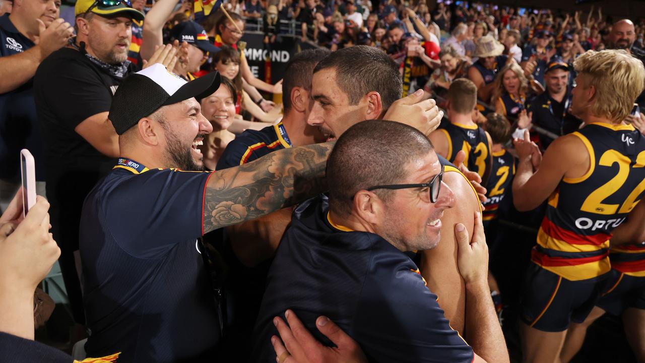 Taylor Walker with a group of Crows fans. Picture: Getty Images