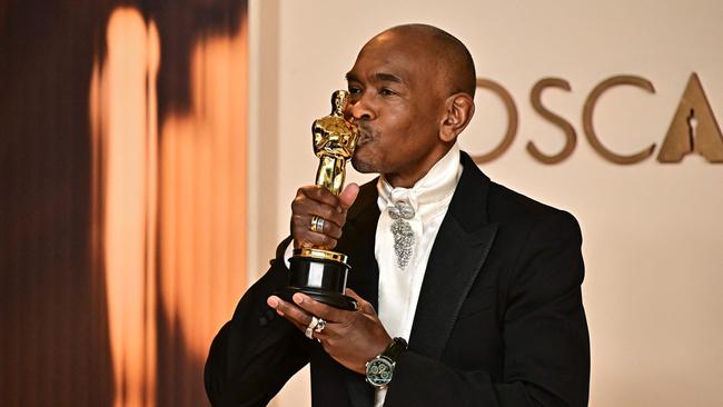 US costume designer Paul Tazewell with the Oscar for Best Costume Design for ‘Wicked’. He became the first Black man to win the award. Picture: Frederic J. Brown / AFP