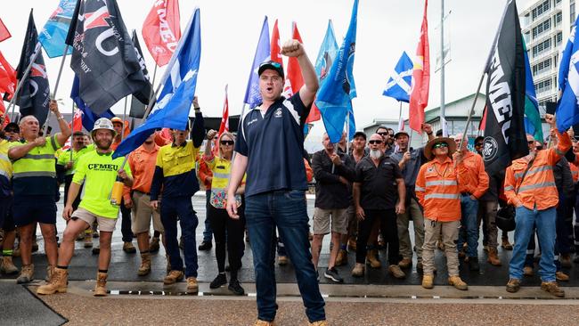 CFMEU Far North Queensland organiser Rolly Cummins rallies union members from the ETU, QBuild, RoadTek and the CFMEU in front of Cairns MP Michael Healy's office. Picture: Brendan Radke