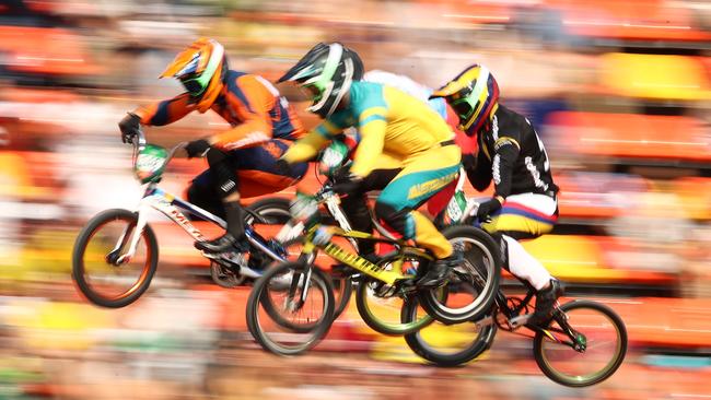 Twan van Gendt of the Netherlands and Sam Willoughby compete in the air over the BMX track.