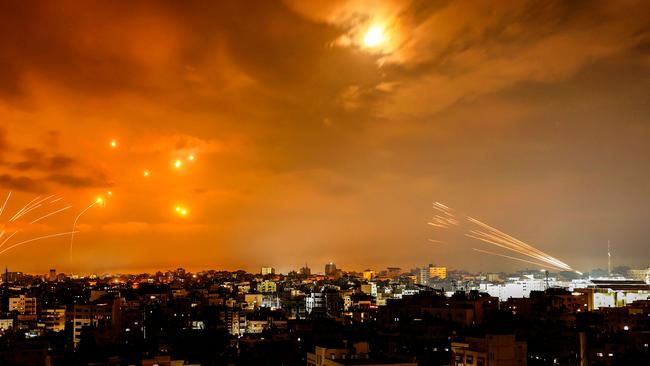 Rockets fired by Palestinian militants from Gaza City are intercepted by the Israeli Iron Dome defence missile system in the early hours of October 8, 2023. Picture: Eyad Baba/AFP